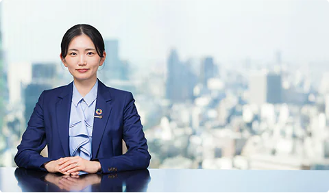 本店　法人部 堤　はるな